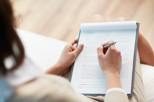 Woman Filling Out Form